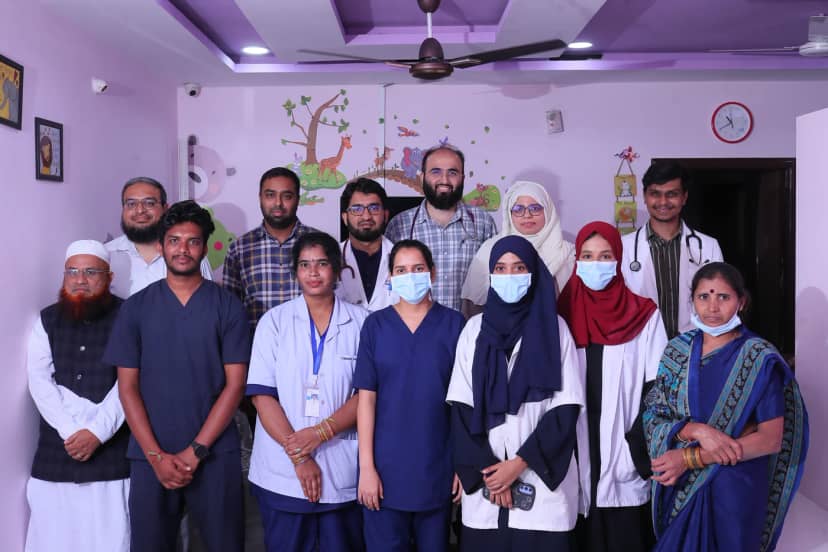 The staff of Caspian Healthcare: doctors, nurses, pharmacist, laboratory technician and support staff